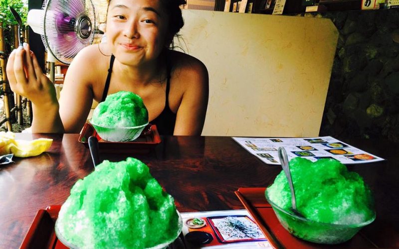 Photo of a woman and a table with shaved ice
